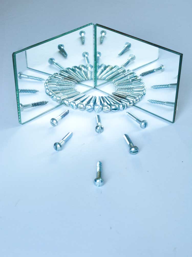 Contemporary art - mirror reflecting objects in optical illusion effect