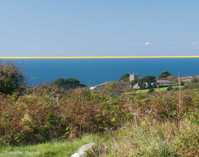 Art in the environment - stretched cord along sea horizon