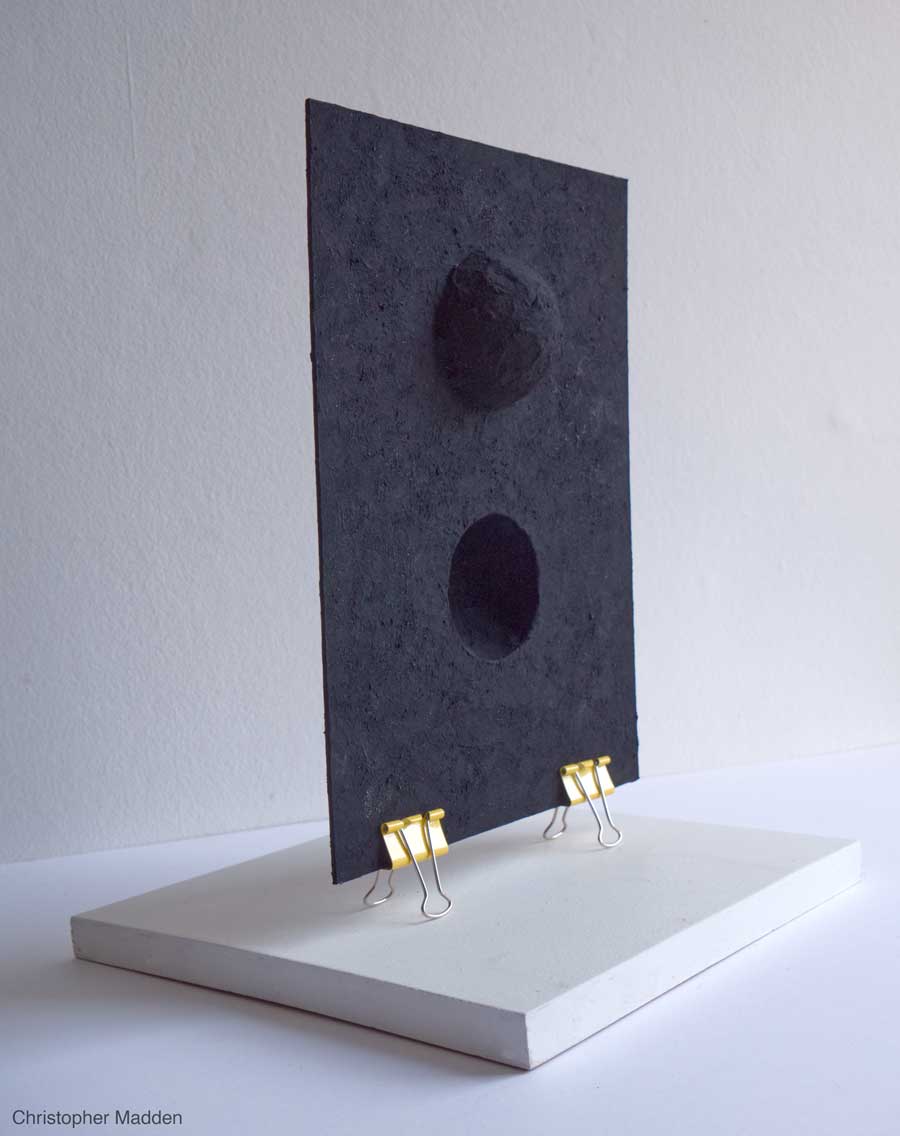 Contemporary art and science sculpture. Black holes in black space