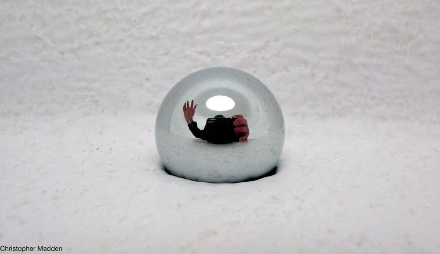 contemporary sculpture reflective steel sphere